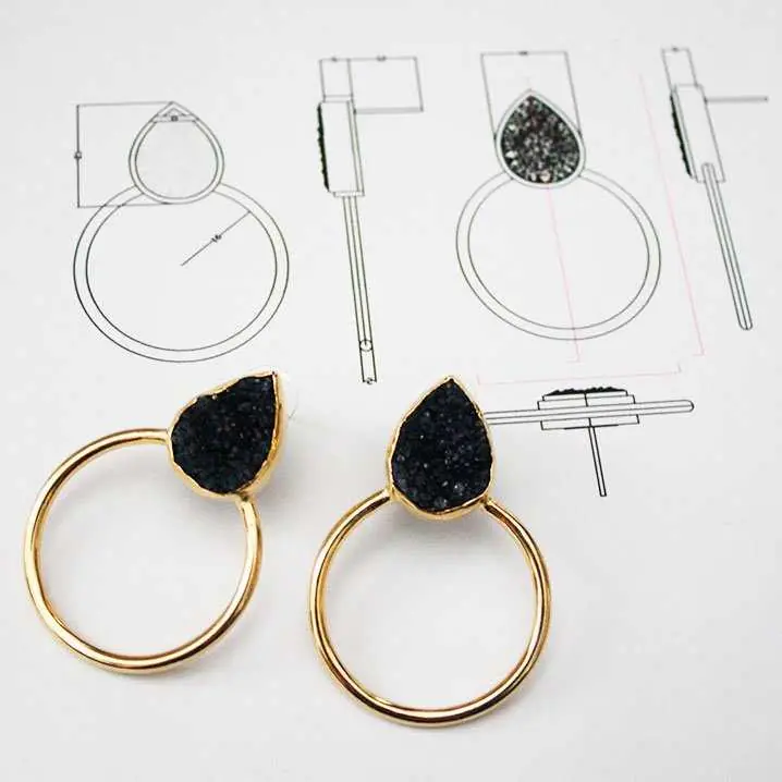 Pendientes Diwa de ACUS Complementos con planos de patente, joyería de diseño arquitectónico en Núñez de Balboa