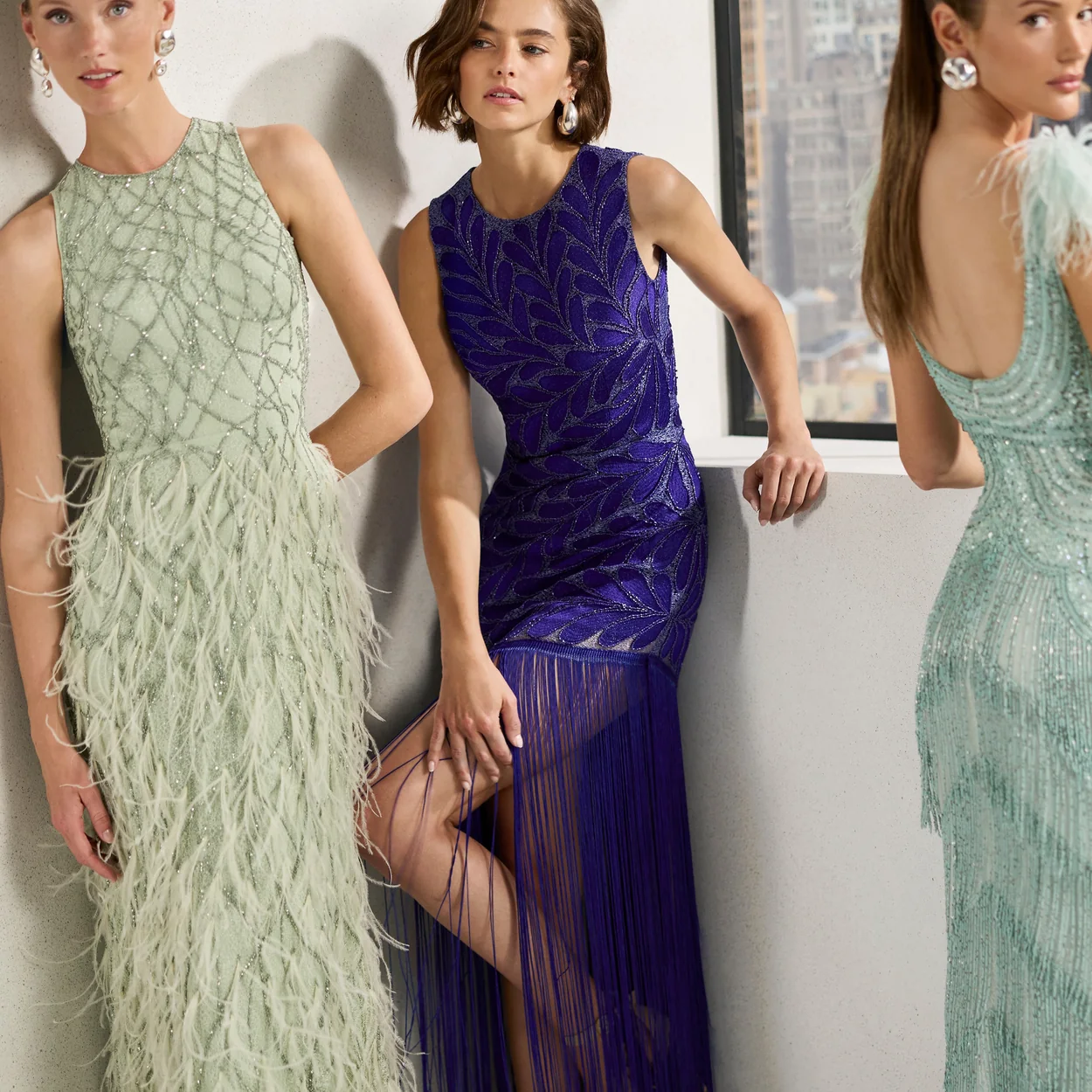 Vestidos de fiesta verde, morado y azul de Rosa Clara