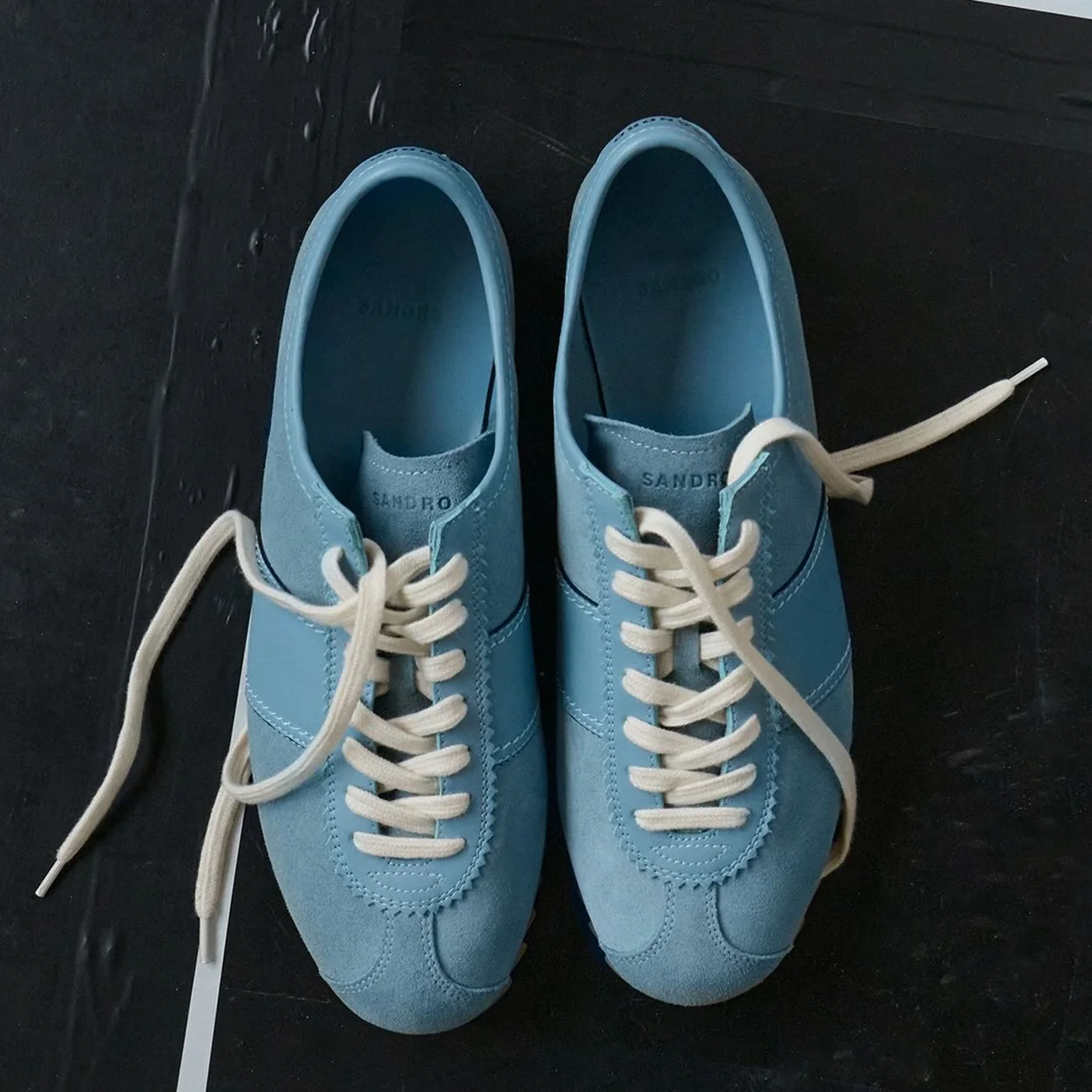 Zapatillas de piel azul claro de Sandro